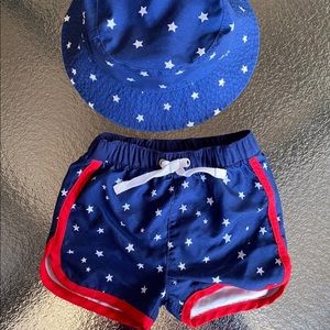 Swimming trunks and hat